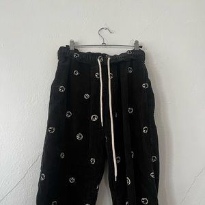 Urban outfitters black smiley face corduroy pants